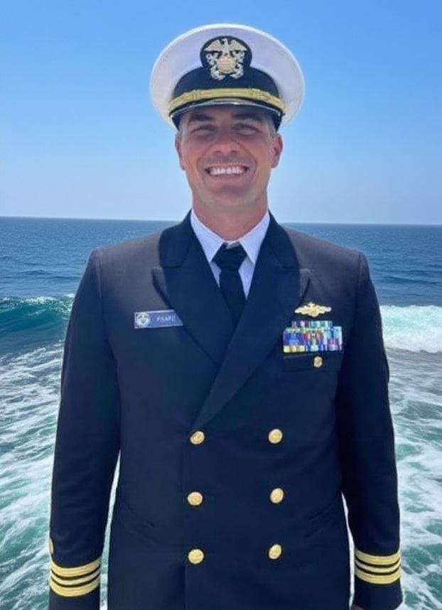 Joseph Trocino steers the boat