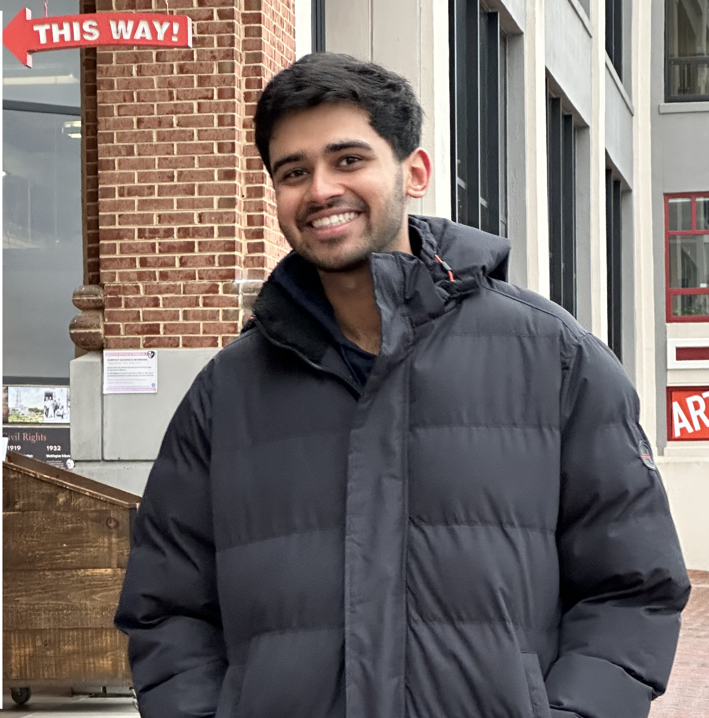 Vidit Vaywala smiles and has his hands in pockets 