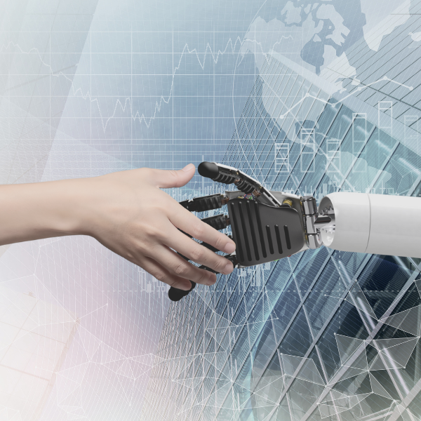 Robot hand and human hand shake hands.