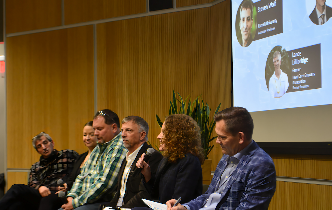 Image: From left, Dr. Steven Wolf, Rebecca Bartels, Jason Orr, Lance Lillibridge, Laura Gentry, and Tod Janzen serving on the panel discussing digital agriculture