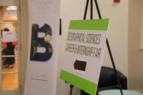 Sign pointing to GEOG career fair
