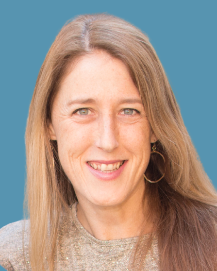 Headshot of Louise Chini against blue background
