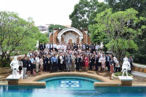 NASA EO Thailand meeting participants, group photo outside with trees and pool