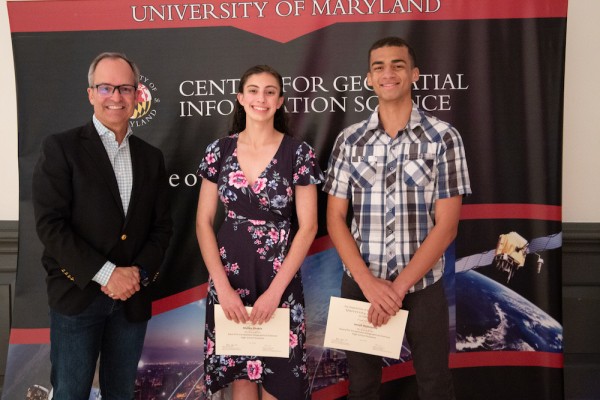 Dr. Hurtt and students Malika Shukla and Jonah Richmond posing with their certificates