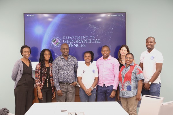 Participants from the July 2023 ECAAS workshop hosted by NASA Harvest at the University of Maryland. Pictured left to right: Dr. Catherine Nakalembe, UMD; Diana Frimpong, UMD; Kennedy Anahinga, Kenya Ministry of Agriculture; Esther Maina, Kenya Space Agency; John Juma Katana, Kenya Ministry of Agriculture; Taryn Devereux, UMD; Jane Kioko, Kenya Ministry of Agriculture; Peter Okello, Kenya Space Agency.