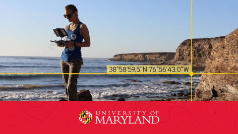 Woman on the beach managing a drone