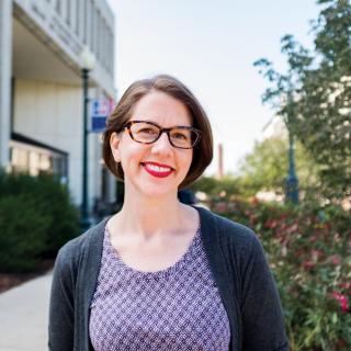 Joy Adams in front of AU's Bender Library
